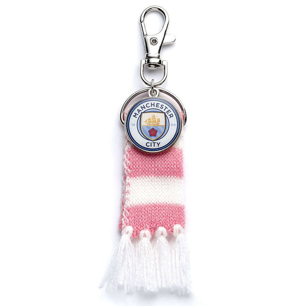 Manchester City FC Pink Bar Scarf Bag Charm LKT Sport Pink and white bar scarf design bag charmWith a full colour City crest charm and lobster claw claspOfficial licensed productApprox 60mm x 30mm Keychains