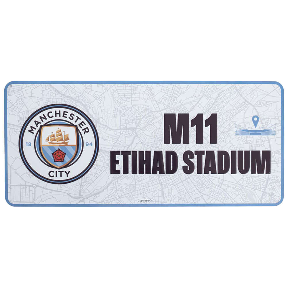 Manchester City FC Route To Sign LKT Sport Gloss finish design stamped metal wall signFeaturing a street map view on route to Etihad StadiumReady to hang on the wall with four small holes for fixingOfficial licensed productApprox 40cm x 18cm Novelty Signs Main image