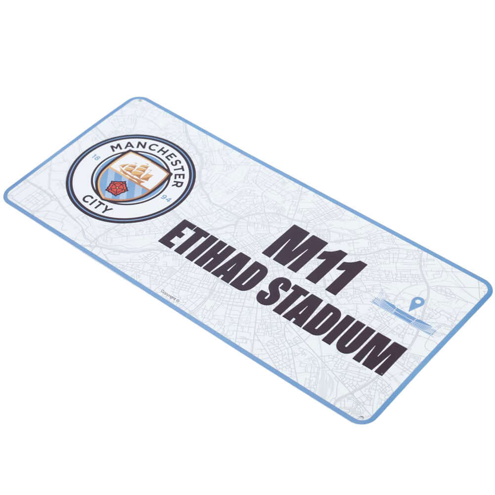 Manchester City FC Route To Sign LKT Sport Gloss finish design stamped metal wall signFeaturing a street map view on route to Etihad StadiumReady to hang on the wall with four small holes for fixingOfficial licensed productApprox 40cm x 18cm Novelty Signs