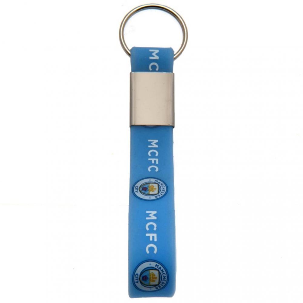 Manchester City FC Silicone Keyring LKT Sport Silicone strap keyring with silver colour metal band and split ring Vibrant sky blue strap with full colour crest and MCFC text design Official licensed product Approx 10cm x 1.5cm On a header card Keychains