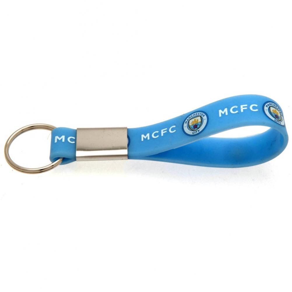 Manchester City FC Silicone Keyring LKT Sport Silicone strap keyring with silver colour metal band and split ring Vibrant sky blue strap with full colour crest and MCFC text design Official licensed product Approx 10cm x 1.5cm On a header card Keychains