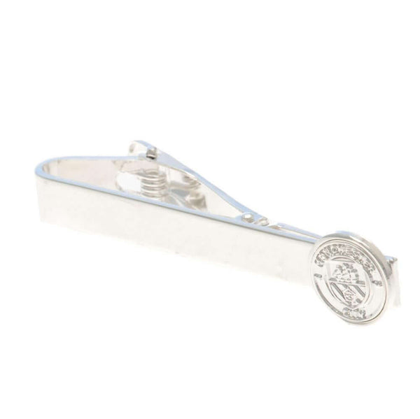 Manchester City FC Silver Plated Tie Slide LKT Sport Classic design tie slide in a mirror finishSilver Plated pin featuring the City crestWith a crocodile clip backOfficial licensed productApprox 50mm x 12mm Tie Clips