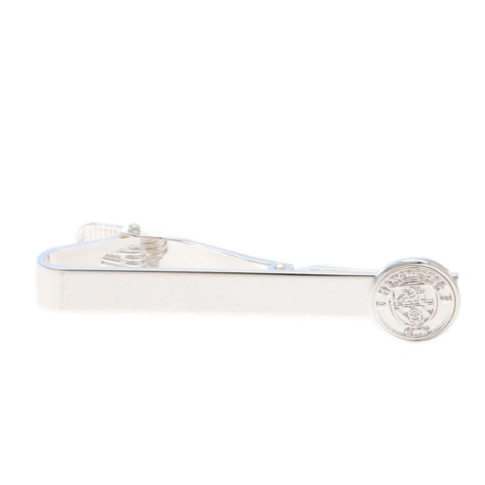 Manchester City FC Silver Plated Tie Slide LKT Sport Classic design tie slide in a mirror finishSilver Plated pin featuring the City crestWith a crocodile clip backOfficial licensed productApprox 50mm x 12mm Tie Clips