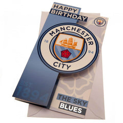 Manchester City FC Sky Blues Birthday Card LKT Sport Colourful gloss finish fold out birthday cardFeaturing a large cut out Man City crest designMessage inside reads 'Hope You Have a Brilliant Day'Official licensed productApprox 22cm x 12cm Greeting Cards