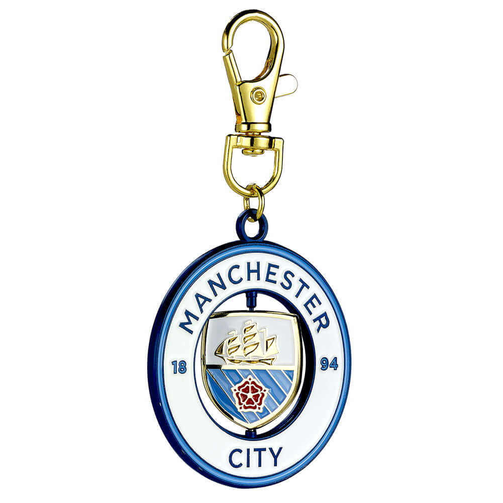 Manchester City FC Spinner Bag Charm LKT Sport Bright, colourful and highly detailed metal bag charmFeaturing a spinning center with the City crestWith a lobster claw claspOfficial licensed productApprox 50mm x 50mm Charms
