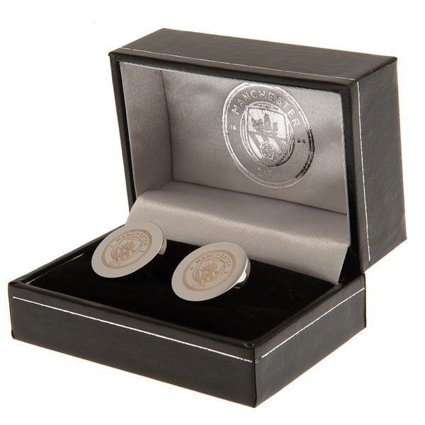Manchester City FC Stainless Steel Round Cufflinks LKT Sport Stainless steel round cufflinks in a chrome finishEach cufflink is engraved with the Man City FC crestOn a bullet back fixingOfficial licensed productApprox 20mm x 20mm Cufflinks