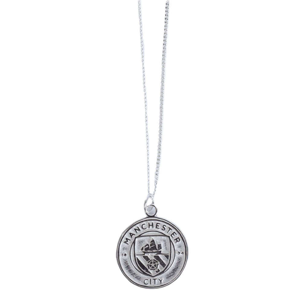 Manchester City FC Sterling Silver Pendant & Chain LKT Sport Sterling silver pendant and necklaceFeaturing a Man City crest pendant on a chain necklaceWith a lobster claspOfficial licensed productChain approx 49cm (19in)Pendant Approx 18mm x 18mm Charms &