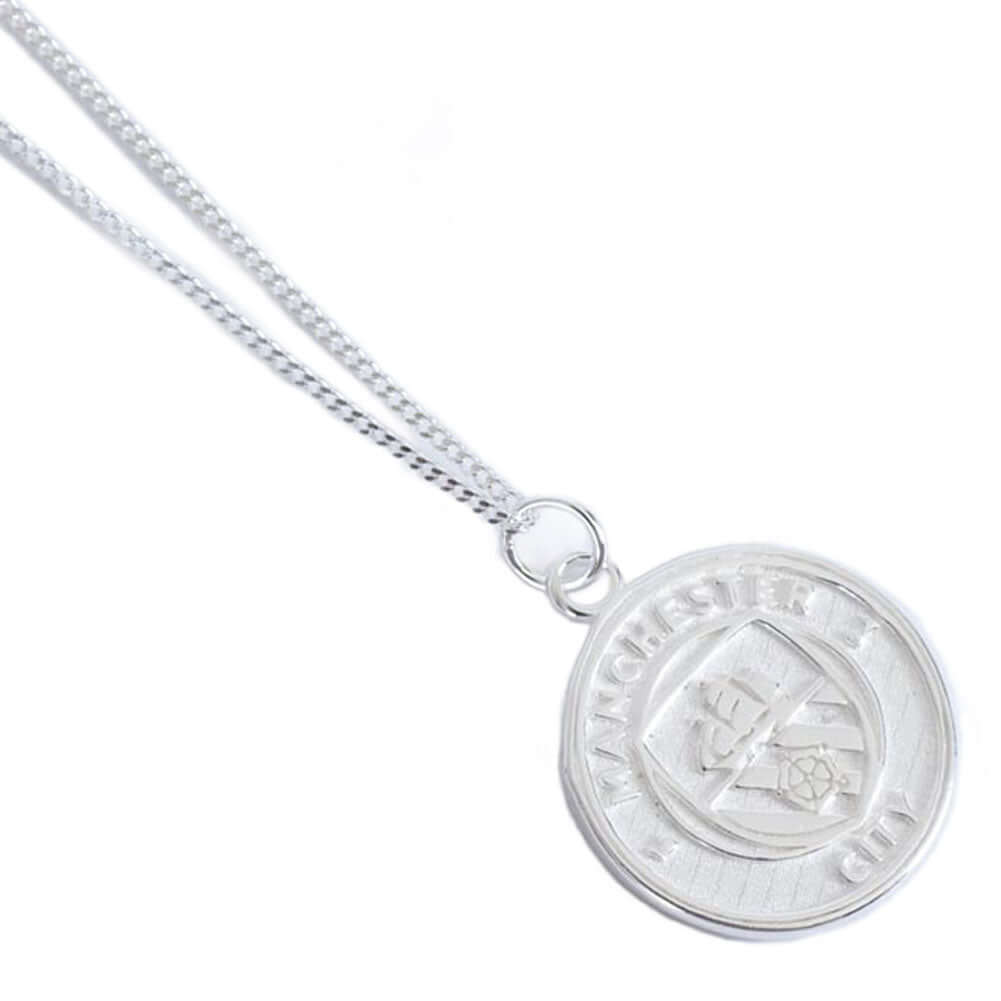 Manchester City FC Sterling Silver Pendant & Chain LKT Sport Sterling silver pendant and necklaceFeaturing a Man City crest pendant on a chain necklaceWith a lobster claspOfficial licensed productChain approx 49cm (19in)Pendant Approx 18mm x 18mm Charms &