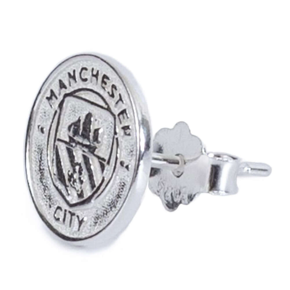 Manchester City FC Sterling Silver Stud Earring LKT Sport Highly detailed sterling silver shaped earringFeaturing the Manchester City crest on an earring studWith a butterfly back fixingOfficial licensed productApprox 10mm x 10mm Earrings