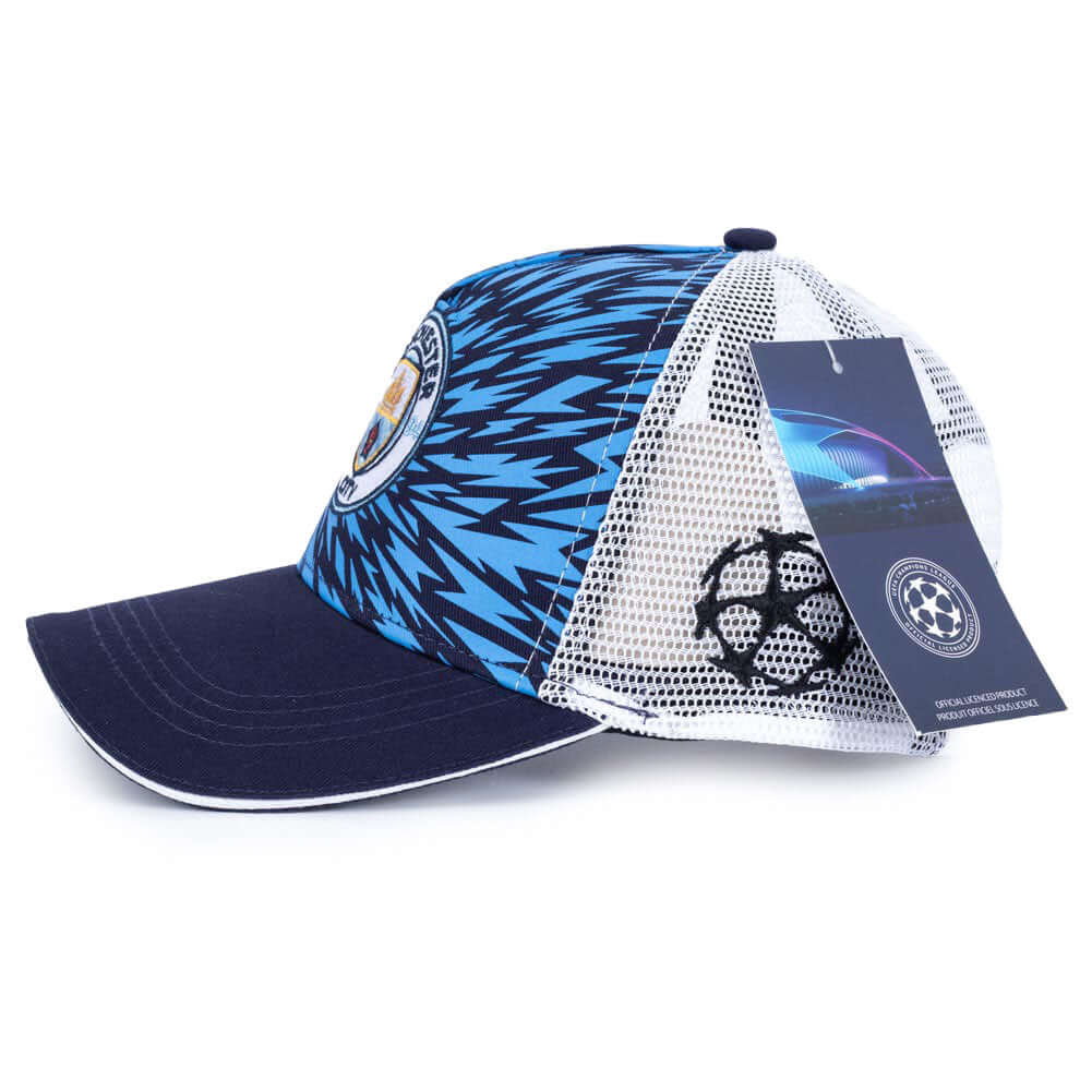 Manchester City FC UCL Trucker Cap LKT Sport Bright blue classic design curve brim hat with striking detail on the front and a white mesh at the backFeaturing both the Manchester City and UCL logoWith a snapback size adjuster 55-61cm100% Cotton twill pane