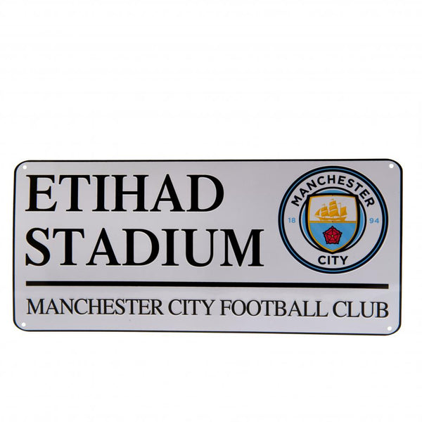 Manchester City FC White Street Sign LKT Sport Gloss finish design stamped metal wall sign Etihad Stadium road sign, the home of Man City FC on a white background Ready to hang on the wall with four small holes for fixing Official licensed product Approx