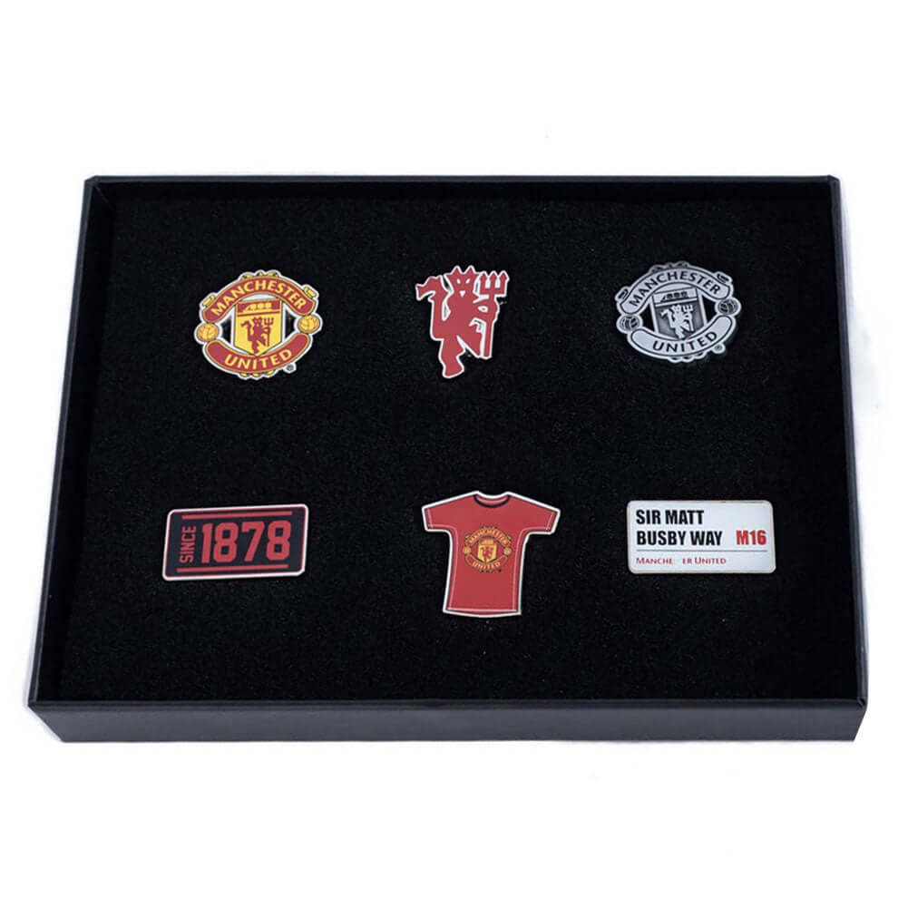 Manchester United FC 6pc Badge Set LKT Sport Metal pin badge set featuring 6 different designsDie stamped with full colour infillWith butterfly clasp fixingMetal alloy with silver style finishOfficial licensed product6 assorted size badges Pinback Buttons