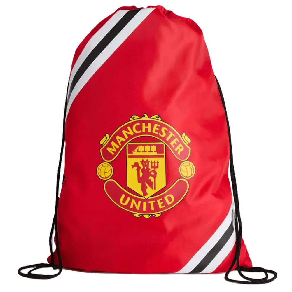 Manchester United FC Core Stripe Gym Bag LKT Sport Fade design gym bag featuring MUFC text and full colour club crestDrawstring close with metal eyeletsWipe clean polyesterOfficial licensed productApprox 44cm x 33cm flat Prints