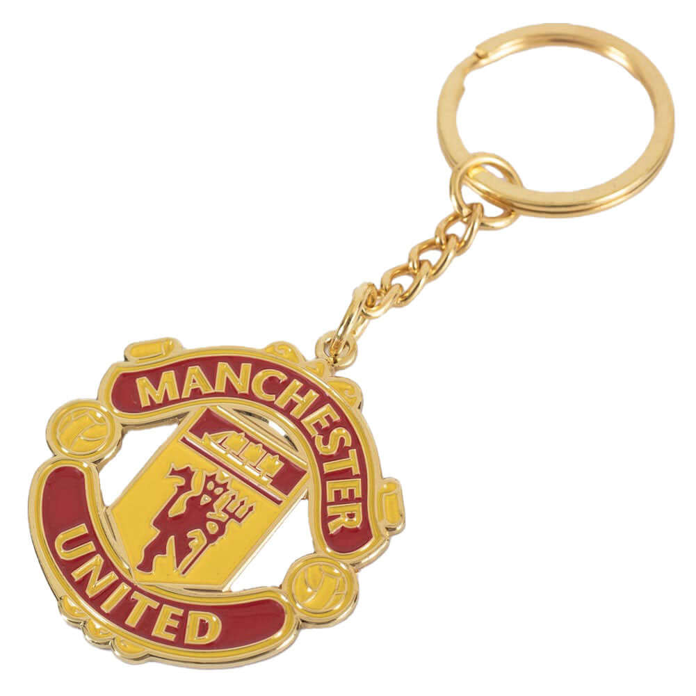Manchester United FC Keyring & Badge Set LKT Sport Metal crest shaped keyring with chain and split ringCrest shaped pin badge with stud fasteningDie stamped design with full colour enamel infillMetal alloy with gold style finishOfficial licensed productKe