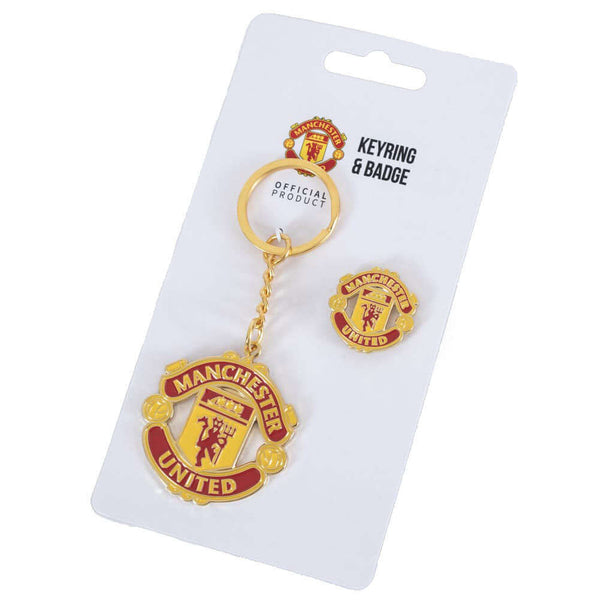 Manchester United FC Keyring & Badge Set LKT Sport Metal crest shaped keyring with chain and split ringCrest shaped pin badge with stud fasteningDie stamped design with full colour enamel infillMetal alloy with gold style finishOfficial licensed productKe