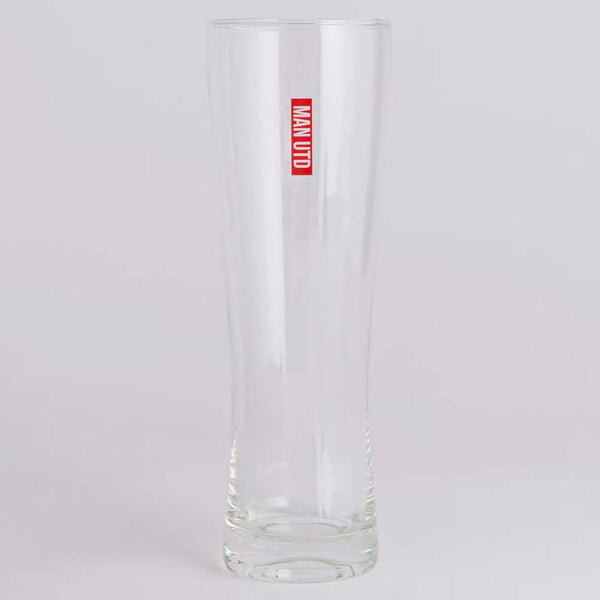 Manchester United FC Mono Crest Tall Beer Glass LKT Sport Tall slim pilsner style pint glassFeaturing a white Manchester United club crestRed & white Man Utd text on small red block detail on reverseOfficial licensed productApprox 570ml (1 pint)Approx 24c