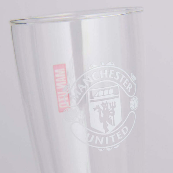 Manchester United FC Mono Crest Tall Beer Glass LKT Sport Tall slim pilsner style pint glassFeaturing a white Manchester United club crestRed & white Man Utd text on small red block detail on reverseOfficial licensed productApprox 570ml (1 pint)Approx 24c