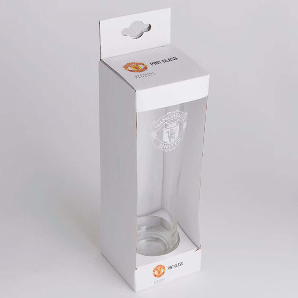 Manchester United FC Mono Crest Tall Beer Glass LKT Sport Tall slim pilsner style pint glassFeaturing a white Manchester United club crestRed & white Man Utd text on small red block detail on reverseOfficial licensed productApprox 570ml (1 pint)Approx 24c
