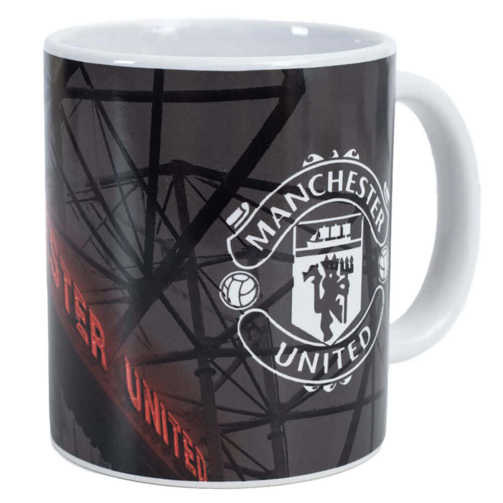 Manchester United FC Old Trafford Mug LKT Sport Ceramic everyday coffee mugOld Trafford design featuring a white club crestGlazed kiln fired finish with white handleOfficial licensed productApprox 315ml (11oz)Approx 9cm tall, 8cm in diameter Mugs Hauptbild