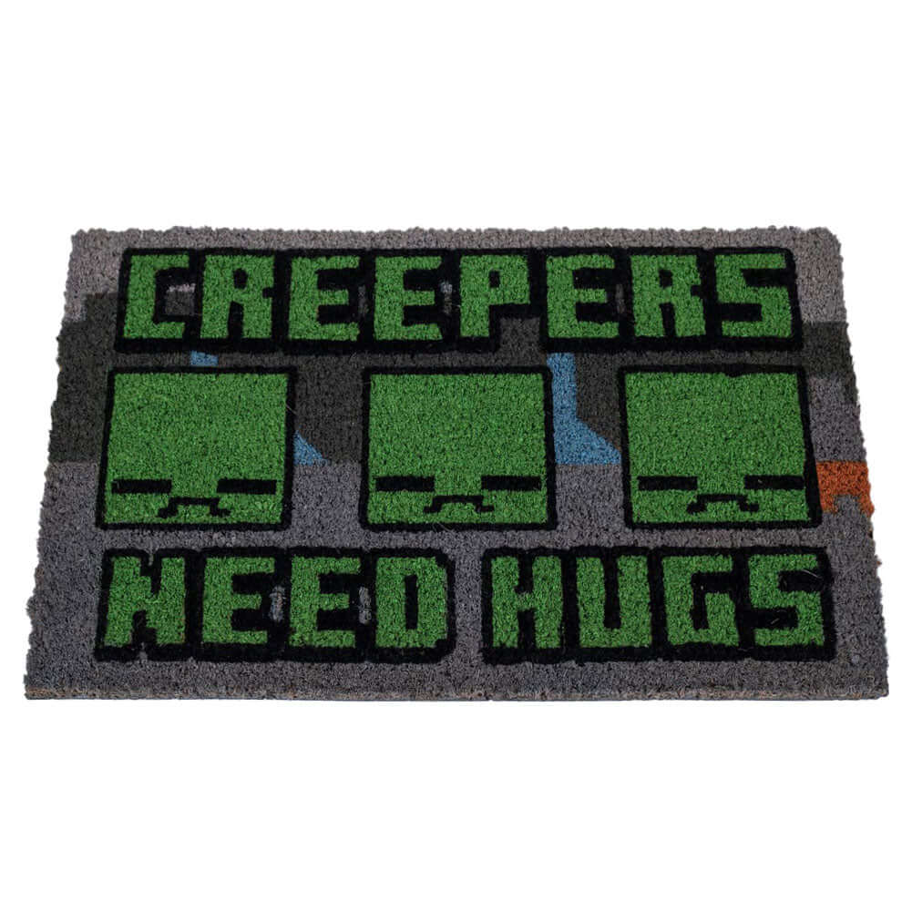 Minecraft Doormat LKT Sport Grey coir doormat featuring the pixelated Creeper faces and the playful warning "Creepers Need Hugs,"Made from durable coconut fibre with a sturdy non slip PVC baseIdeal for both indoors and outdoorsOfficial licensed productApp