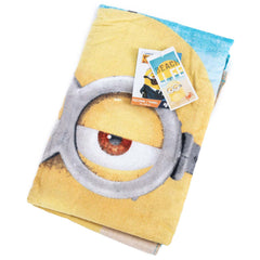 Minions Towel LKT Sport Large soft to touch velour beach towelBeach themed towel featuring the text 'Beach Life' with one of the Minions submerged in sandVibrant 100% cotton towelOfficial licensed productApprox 140cm x 70cm Beach Towels