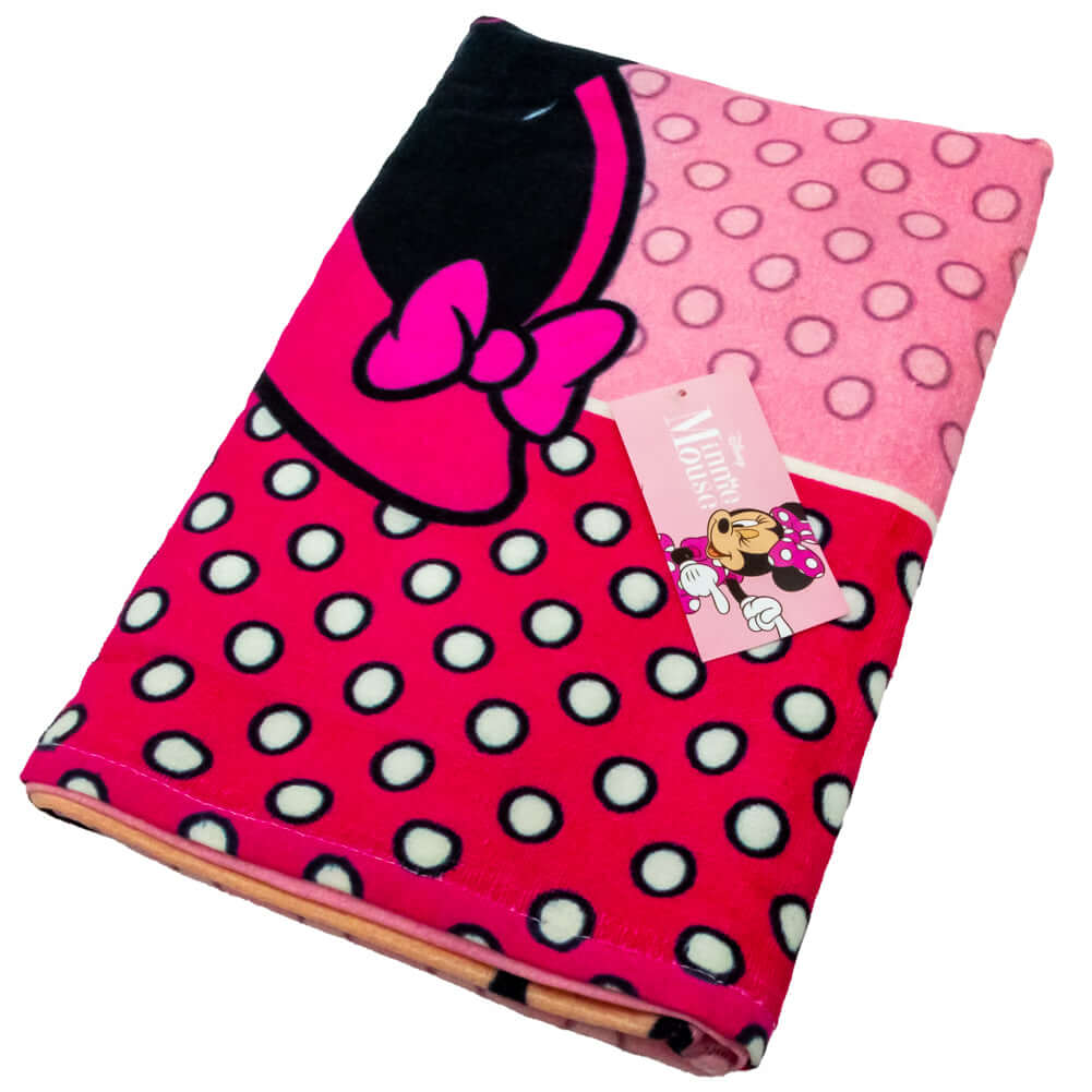 Minnie Mouse Towel LKT Sport Large soft to touch velour beach towelVibrant pink towel featuring a large image of Minnie Mouse in her happy poseVibrant 100% cotton towelOfficial licensed productApprox 140cm x 70cm Beach Towels