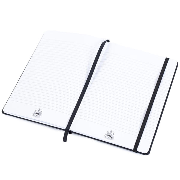 Newcastle United FC A5 Notebook LKT Sport Premium black faux leather design with embossed NUFC crestFeaturing a black elastic closureRuled pages with a handy bookmark, featuring a club crest on every pageOfficial licensed productApprox 14cm x 21cm Journal