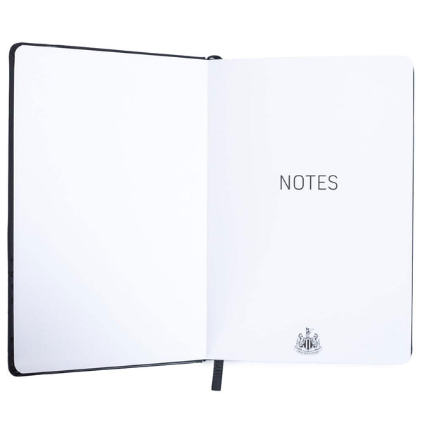 Newcastle United FC A5 Notebook LKT Sport Premium black faux leather design with embossed NUFC crestFeaturing a black elastic closureRuled pages with a handy bookmark, featuring a club crest on every pageOfficial licensed productApprox 14cm x 21cm Journal