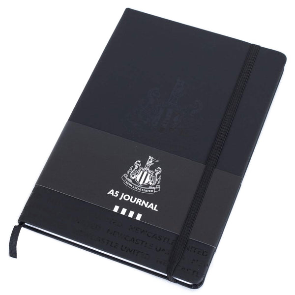 Newcastle United FC A5 Notebook LKT Sport Premium black faux leather design with embossed NUFC crestFeaturing a black elastic closureRuled pages with a handy bookmark, featuring a club crest on every pageOfficial licensed productApprox 14cm x 21cm Journal