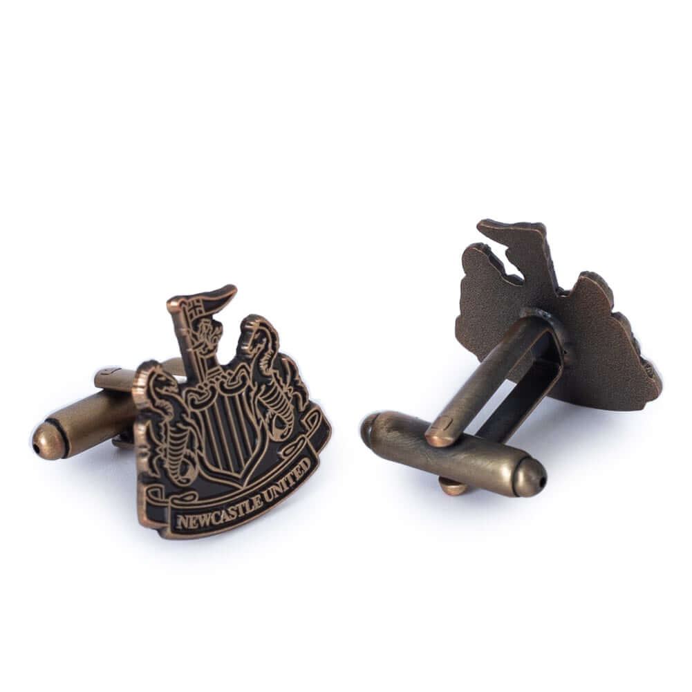 Newcastle United FC Antique Gold Cufflinks LKT Sport Antique gold style finish cufflinksFeaturing a highly detailed formed Newcastle crestOn a bullet back fixingOfficial licensed productApprox 20mm x 20mm Cufflinks