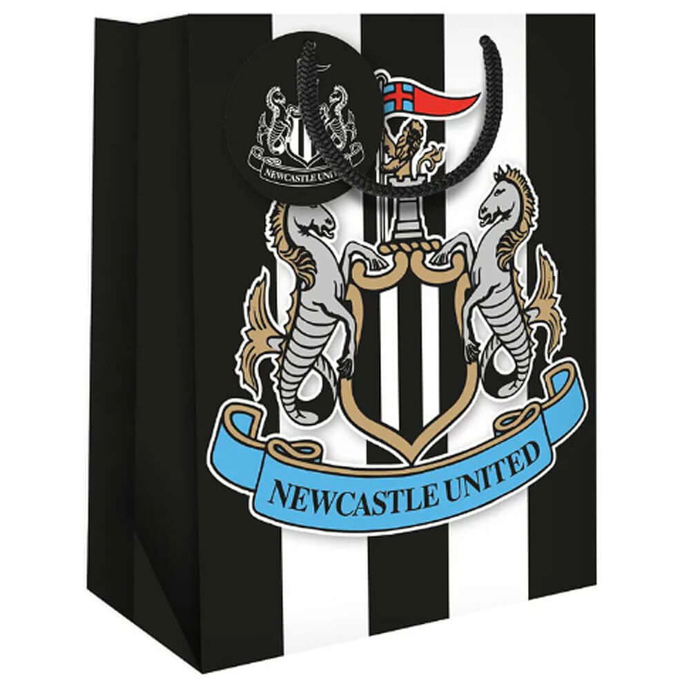 Newcastle United FC Medium Gift Bag LKT Sport Medium sized colour card gift bag and tagFeaturing a large Newcastle cub crestWith ribbon handlesOfficial licensed productApprox 33cm x 26cm Gift Bags
