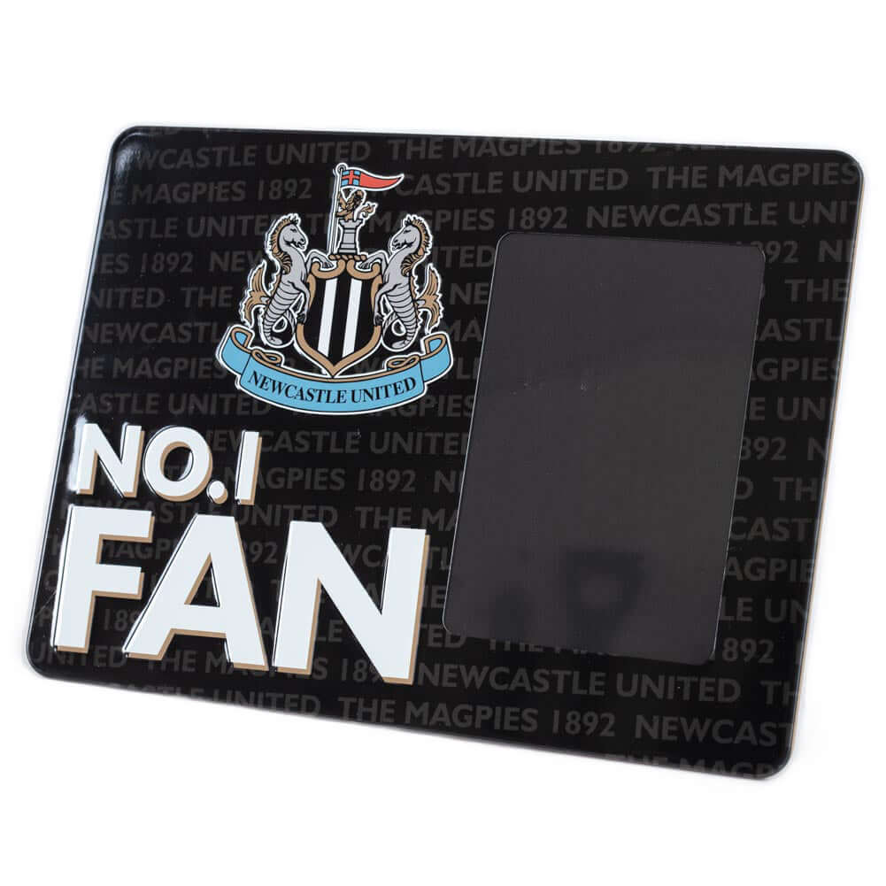 Newcastle United FC No1 Fan Picture Frame Sign LKT Sport Sturdy metal photo frame sign featuring the Newcastle United crest and No.1 FAN in bold white textIncludes the text 'Newcastle United The Magpies 1892' as a repeat pattern in the backgroundWith a po