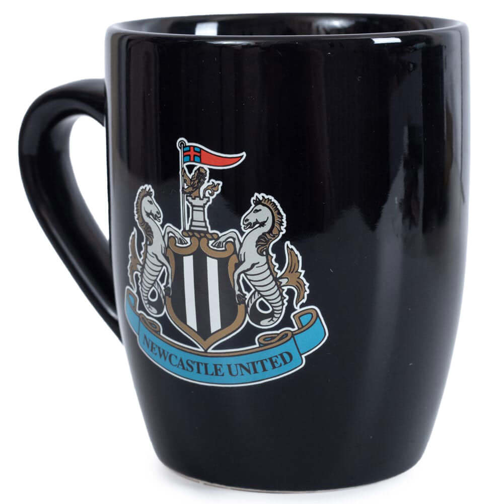 Newcastle United FC Shaped Mug LKT Sport Ceramic everyday coffee mugBlack ceramic mug with a full colour Newcastle United FC crest to one sideGlazed kiln fired finish with full colour handleOfficial licensed productApprox 315ml (11oz)Approx 9cm tall, 8cm