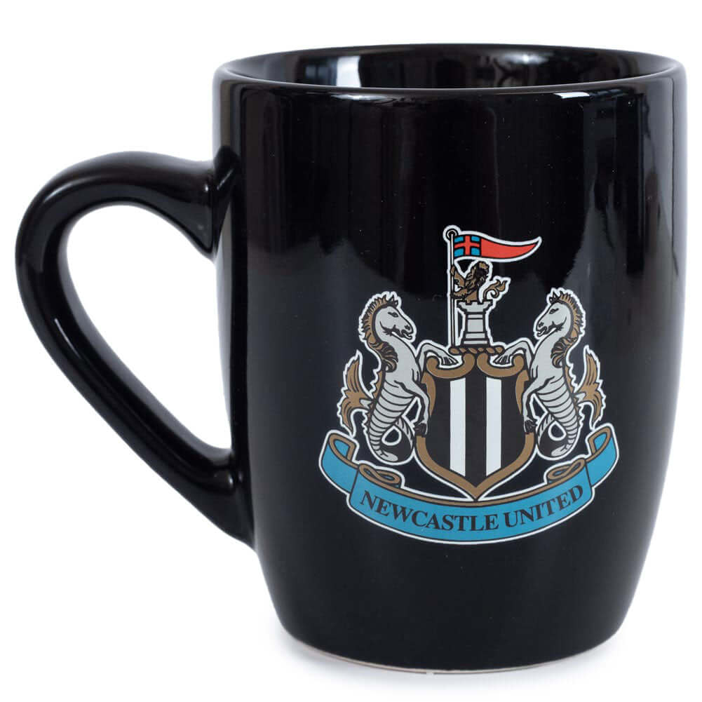 Newcastle United FC Shaped Mug LKT Sport Ceramic everyday coffee mugBlack ceramic mug with a full colour Newcastle United FC crest to one sideGlazed kiln fired finish with full colour handleOfficial licensed productApprox 315ml (11oz)Approx 9cm tall, 8cm