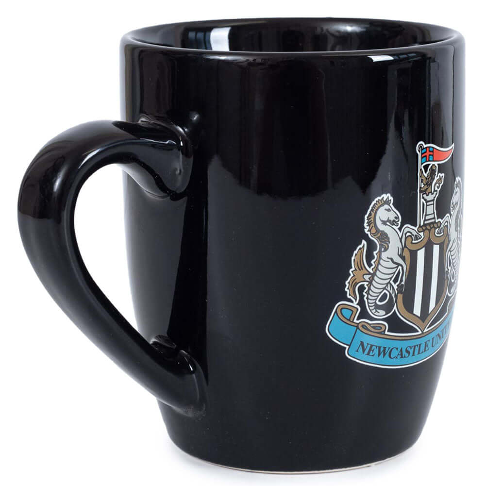 Newcastle United FC Shaped Mug LKT Sport Ceramic everyday coffee mugBlack ceramic mug with a full colour Newcastle United FC crest to one sideGlazed kiln fired finish with full colour handleOfficial licensed productApprox 315ml (11oz)Approx 9cm tall, 8cm