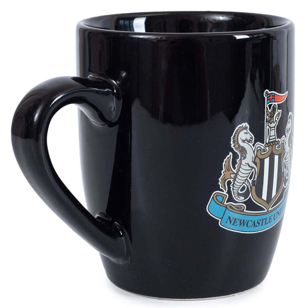 Newcastle United FC Shaped Mug LKT Sport Ceramic everyday coffee mugBlack ceramic mug with a full colour Newcastle United FC crest to one sideGlazed kiln fired finish with full colour handleOfficial licensed productApprox 315ml (11oz)Approx 9cm tall, 8cm