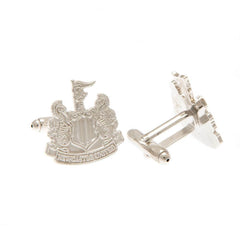Newcastle United FC Silver Plated Formed Cufflinks LKT Sport Silver plated crest shaped cufflinks in a chrome finishFeaturing a highly detailed formed Newcastle crestOn a bullet back fixingOfficial licensed productApprox 22mm x 18mm Cufflinks