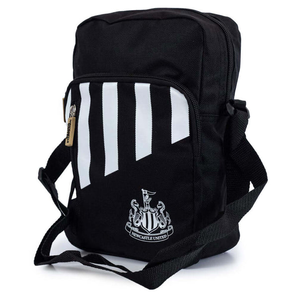 Newcastle United FC Stripe Shoulder Bag LKT Sport Black shoulder bag featuring a stripe design with a white Newcastle United crestMain compartment has a large double zipped opening for easy access2 front zip pockets and interior open pocketAdjustable shou