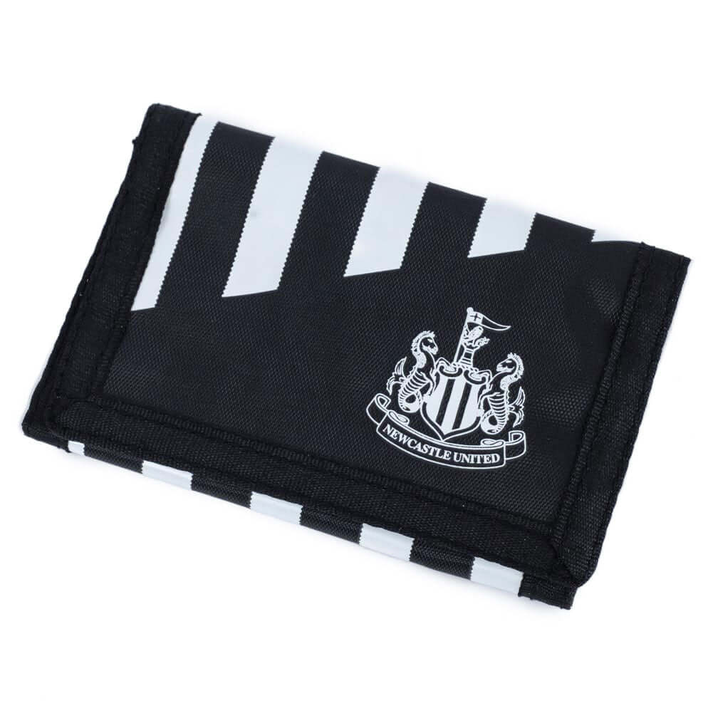 Newcastle United FC Stripe Wallet LKT Sport Black wallet featuring a white stripe design with a white Newcastle United crest on the frontInternal zipped pocket and 7 additional separate compartmentsWipe clean polyesterOfficial licensed productApprox 12cm