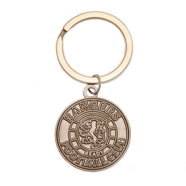 Rangers FC Antique Silver Ready Crest Keyring LKT Sport Metal crest shaped keyring with split ringDie stamped designMetal alloy with antique silver style finishOfficial licensed productApprox 30mm in diameter Keychains