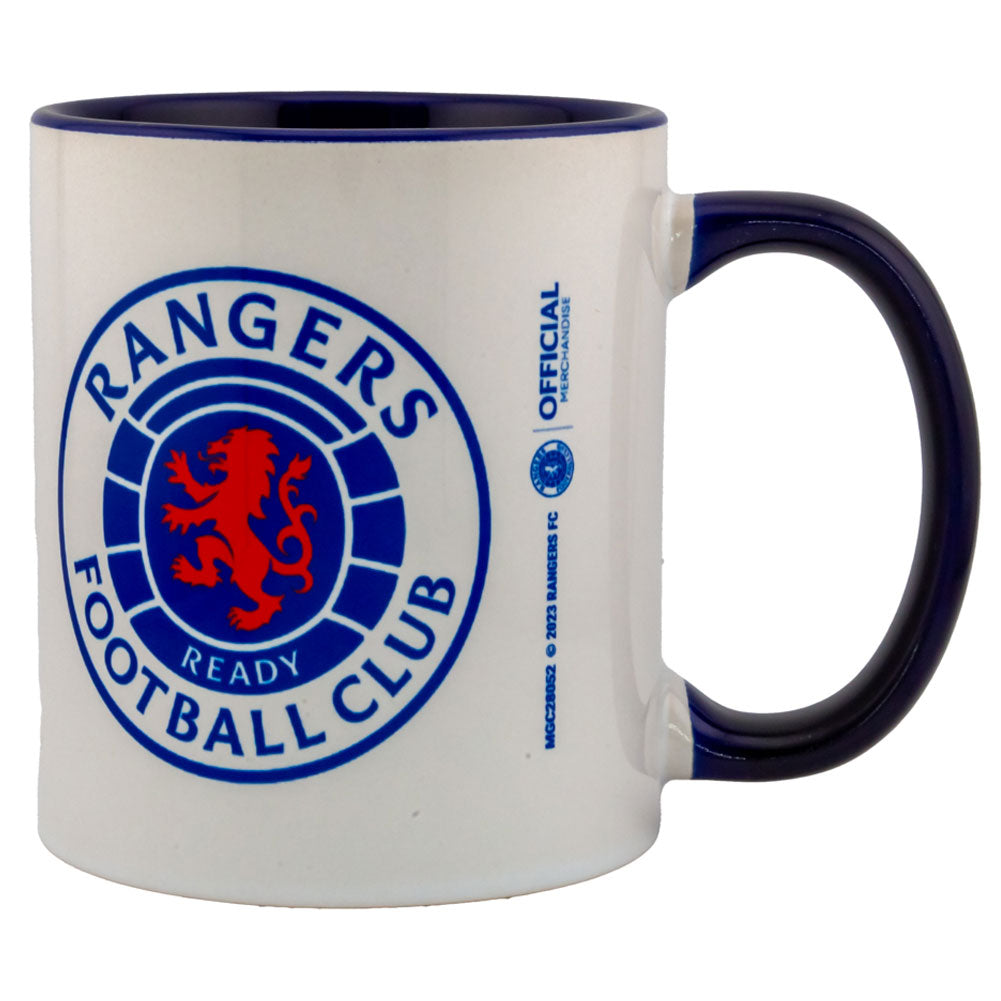 Rangers FC Colour Mug LKT Sport Ceramic everyday coffee mugFeatures the Rangers logo on a white background with a blue innerGlazed kiln fired finish with full colour handleOfficial licensed productApprox 315ml (11oz)Approx 9cm tall, 8cm in diameter Mugs