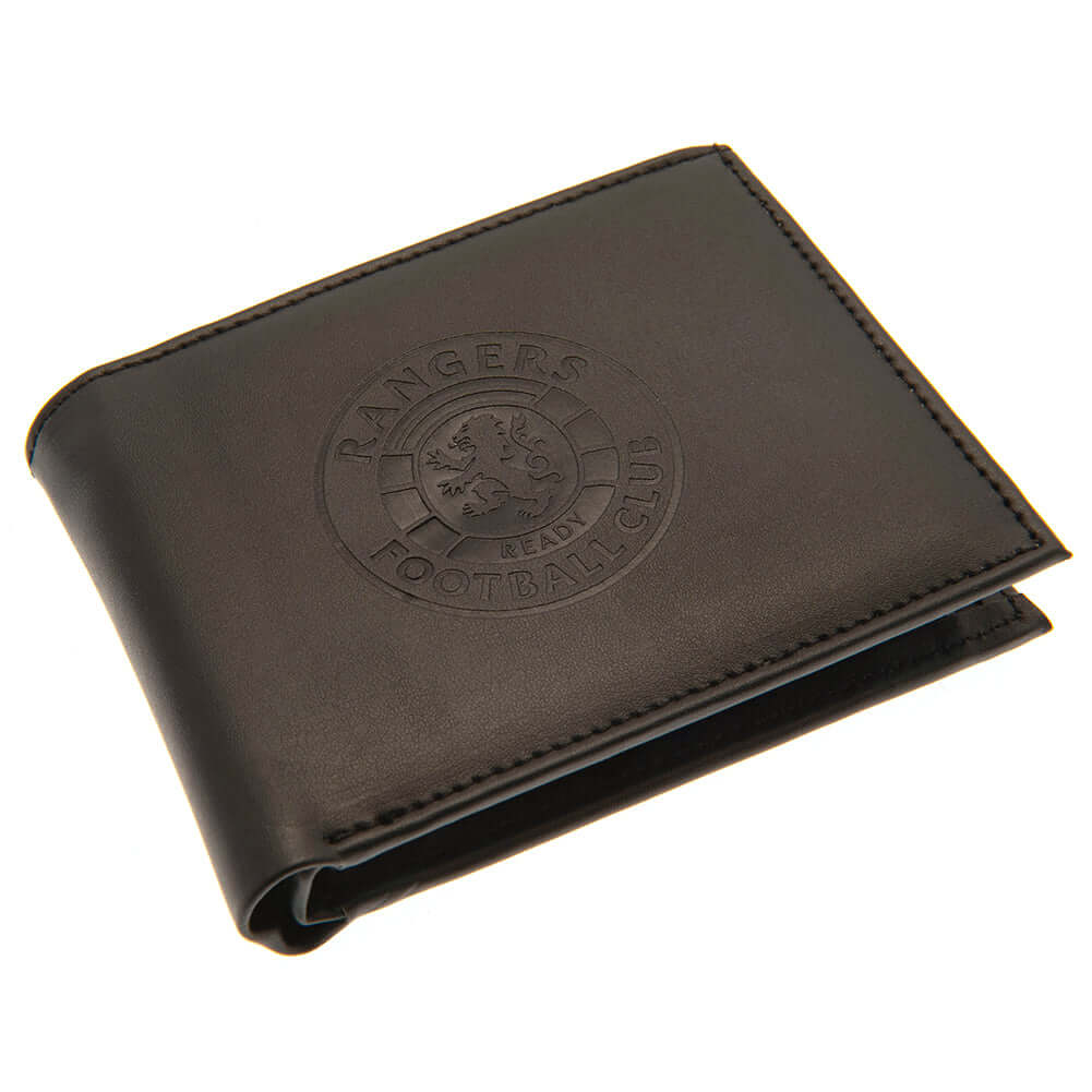 Rangers FC Debossed Wallet LKT Sport Black PU wallet featuring a large debossed club crest3 card slots and 2 note pocketsChange pocket with secure stud fastener2 additional compartmentsOfficial licensed productApprox 11cm x 9cm Wallets
