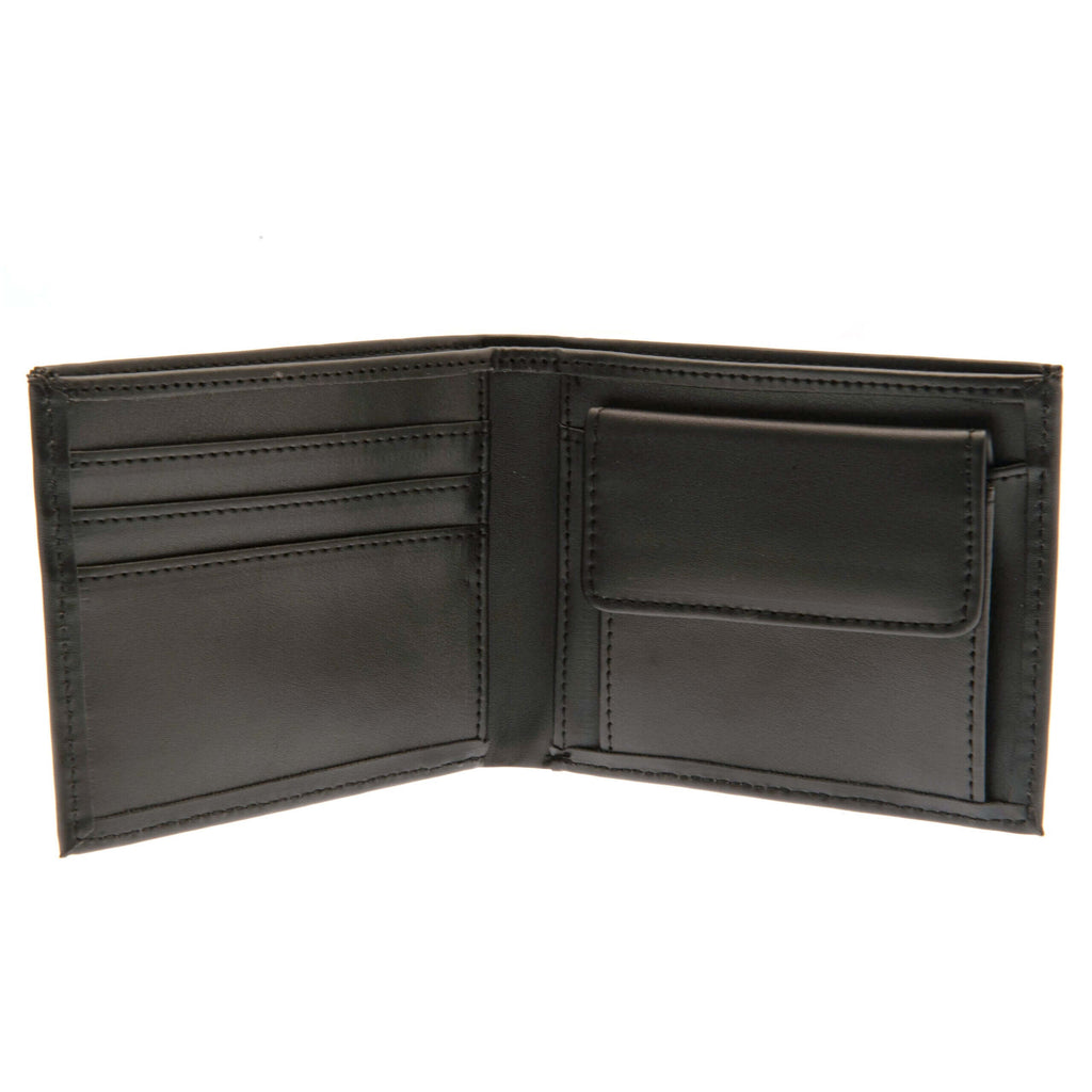 Rangers FC Debossed Wallet LKT Sport Black PU wallet featuring a large debossed club crest3 card slots and 2 note pocketsChange pocket with secure stud fastener2 additional compartmentsOfficial licensed productApprox 11cm x 9cm Wallets