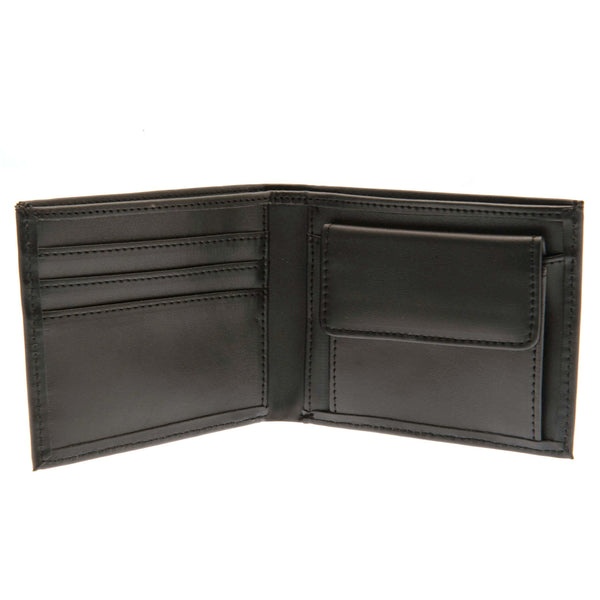 Rangers FC Debossed Wallet LKT Sport Black PU wallet featuring a large debossed club crest3 card slots and 2 note pocketsChange pocket with secure stud fastener2 additional compartmentsOfficial licensed productApprox 11cm x 9cm Wallets