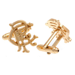 Rangers FC Gold Plated Scroll Crest Cufflinks LKT Sport Gold Plated crest shaped cufflinksFeaturing a highly detailed Rangers FC scroll crestOn a bullet back fixingOfficial licensed productApprox 20mm x 16mm Cufflinks