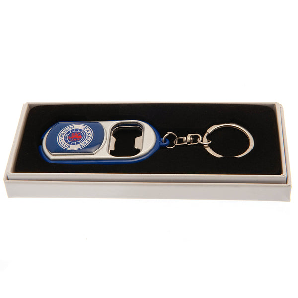 Rangers FC Keyring Torch Bottle Opener LKT Sport Plastic club crested keyringWith a bottle opener functionIncludes a battery powered torchOfficial licensed productApprox 7cm x 3cm Noise Makers