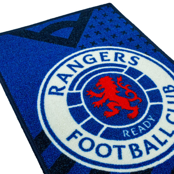 Rangers FC Rug LKT Sport Bright colourful bedroom rug featuring a large central club crestMade from 100% polyamide with a non-slip backingMachine washableOfficial licensed productApprox 80cm x 50cm Rugs