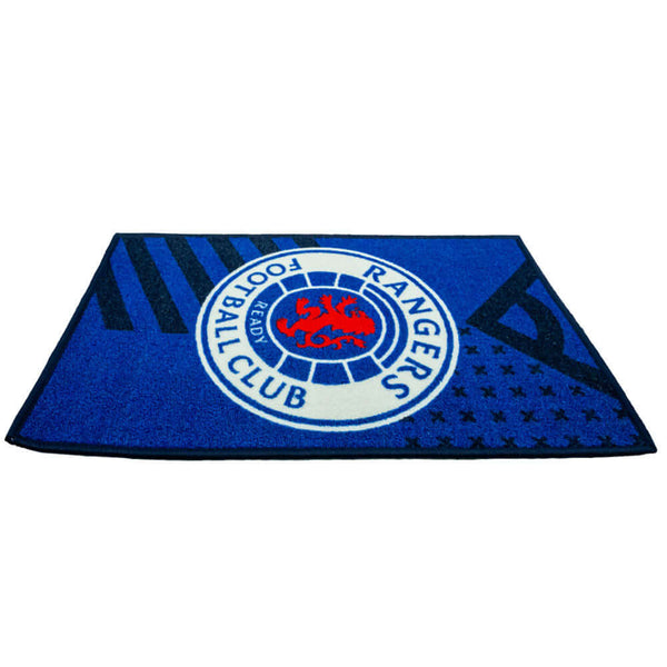 Rangers FC Rug LKT Sport Bright colourful bedroom rug featuring a large central club crestMade from 100% polyamide with a non-slip backingMachine washableOfficial licensed productApprox 80cm x 50cm Rugs