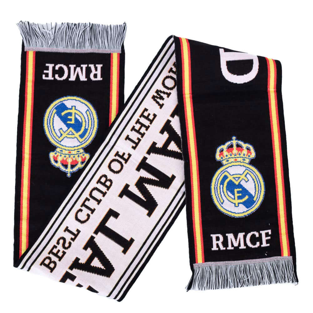 Real Madrid CF Black Scarf LKT Sport Black woven scarf with red and yellow stripe detail and a black and white fringeFeatures Real Madrid and Best Club In The World textOfficial licensed productApprox 136cm x 19cm Scarves