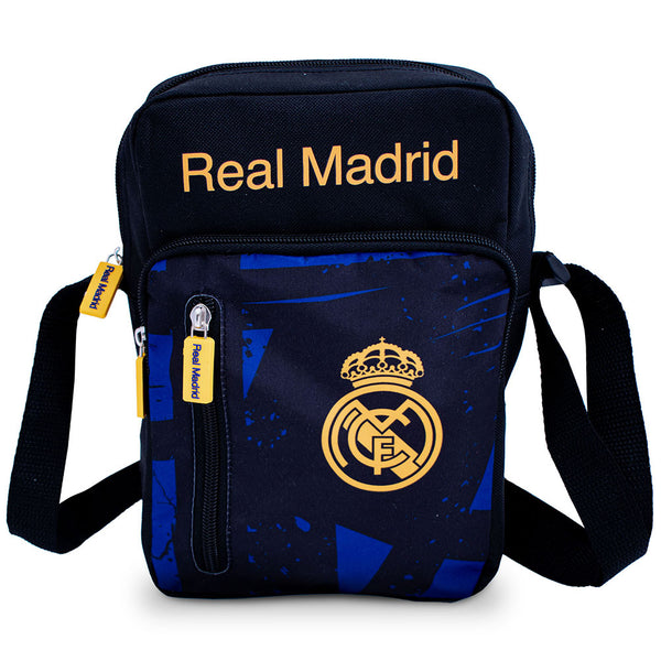 Real Madrid CF Fragment Shoulder Bag LKT Sport Main compartment has a large zip opening2 front zip pockets and interior open pocketAdjustable shoulder strapRubber zip pulls featuring raised Real Madrid detailOfficial licensed productApprox 25cm x 18cm x 8